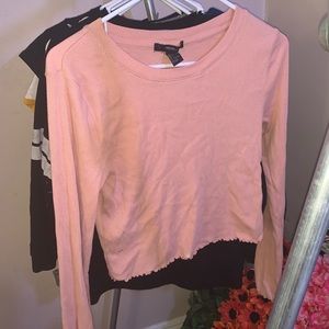 pink long sleeve slightly cropped top